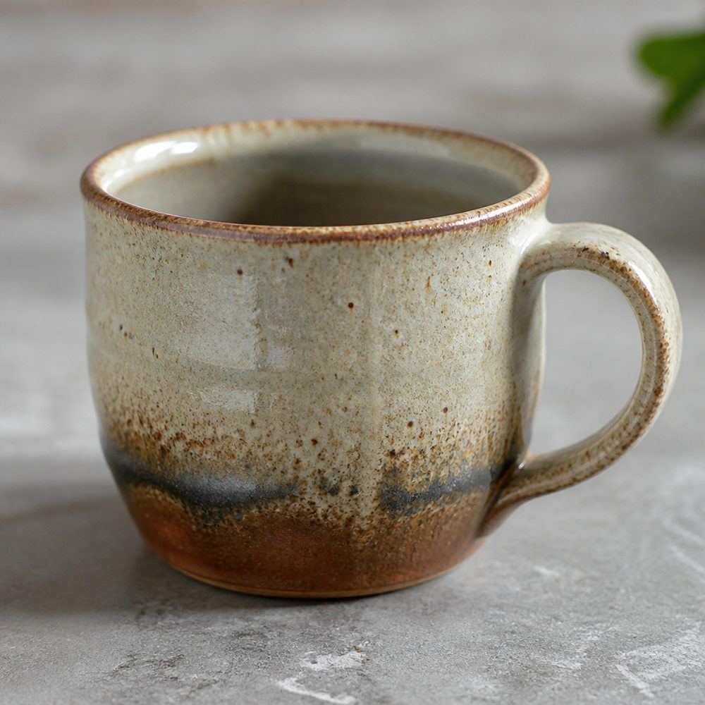 Handmade ceramic bowls on a shelf